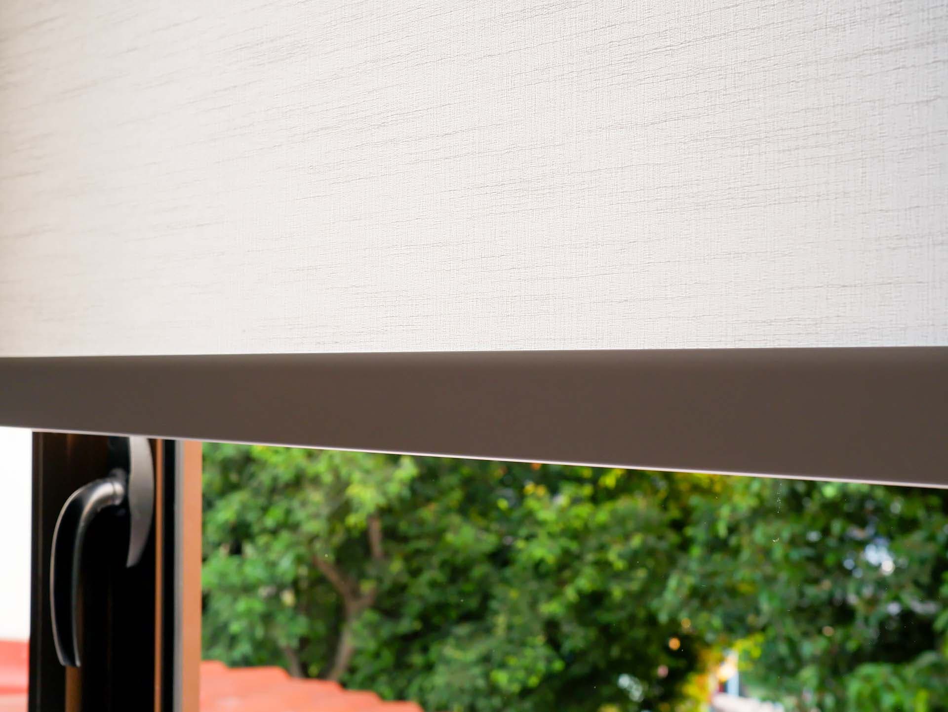 Curtains and roller blinds used as window treatments